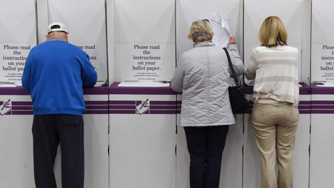 Voters cast their ballots