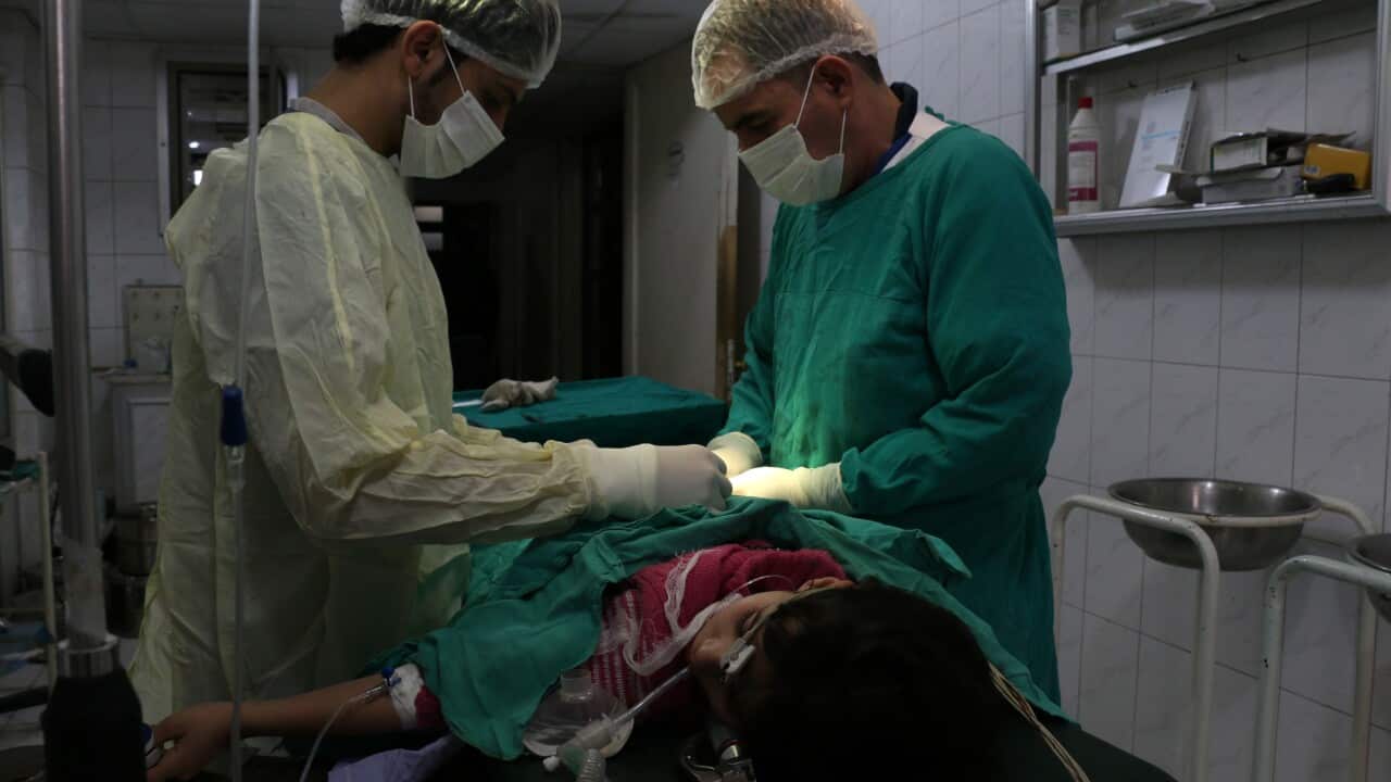 Doctors operate on a boy reportedly injured during shelling in the northern Syrian city of Aleppo getty.jpg