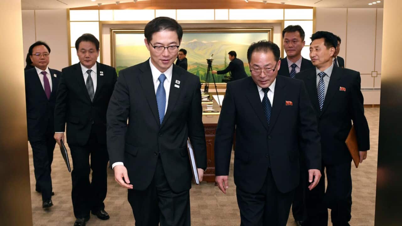 South Korea Unification Ministry, South Korean Vice Unification Minister Chun Hae-sung, center left, and the head of North Korean delegation Jon Jong Su