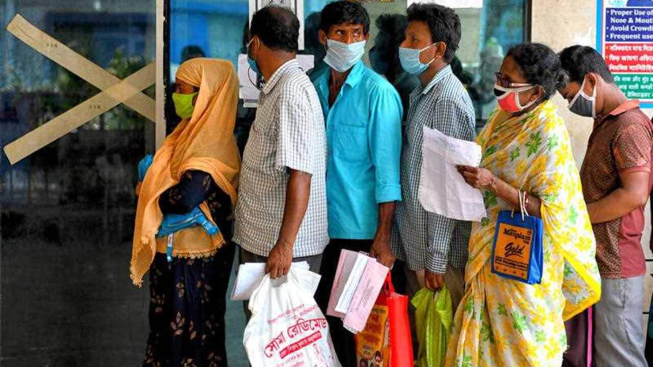 People with Covid 19 symptoms queuing for an Antigen Test at a government hospital.