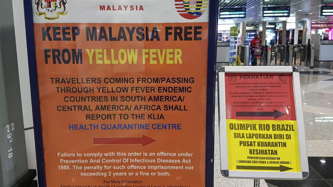 A travel advisory on the yellow fever infection at a Malay airport