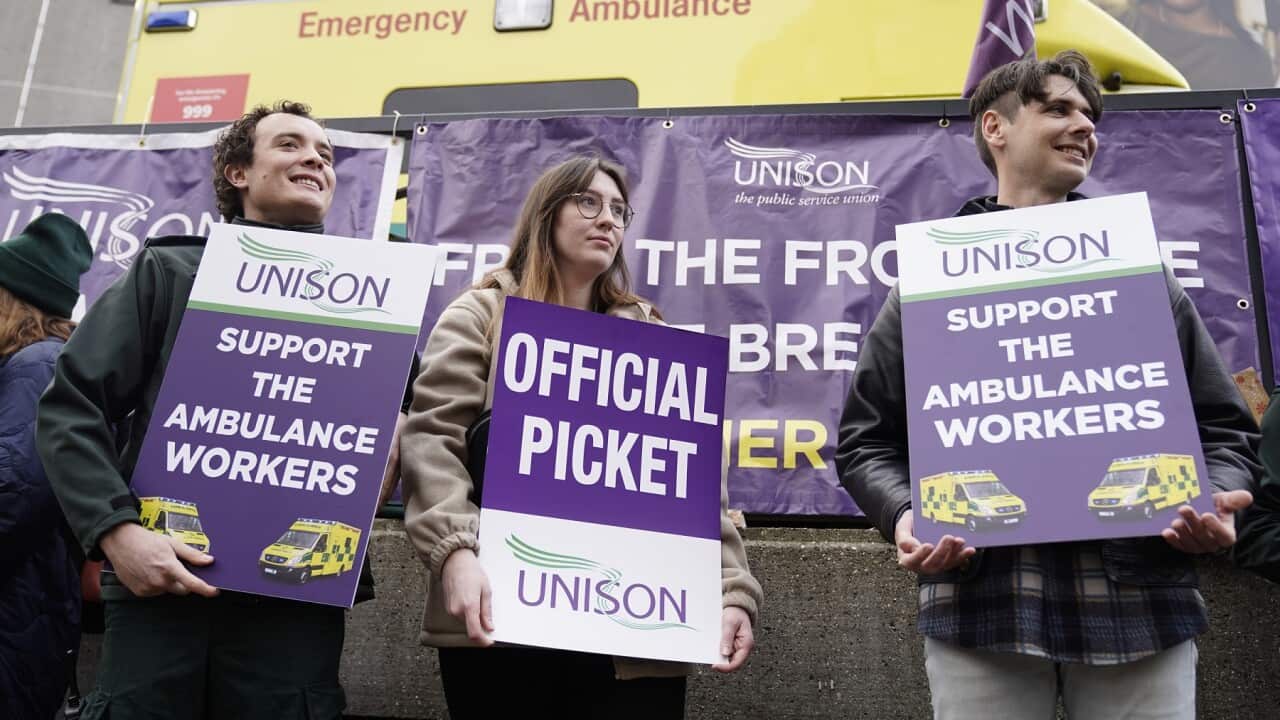 Ambulance workers on the picket line outside a London ambulance station during strike action