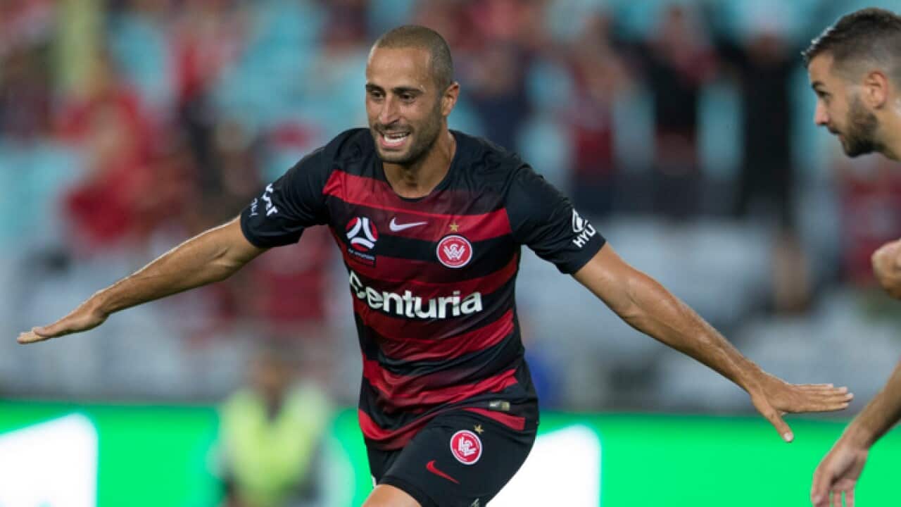 Tarek Elrich of the Wanderers celebrates after Oriol Riera scores during the Round 8 A-League match between the Wanderers and Sydney FC.