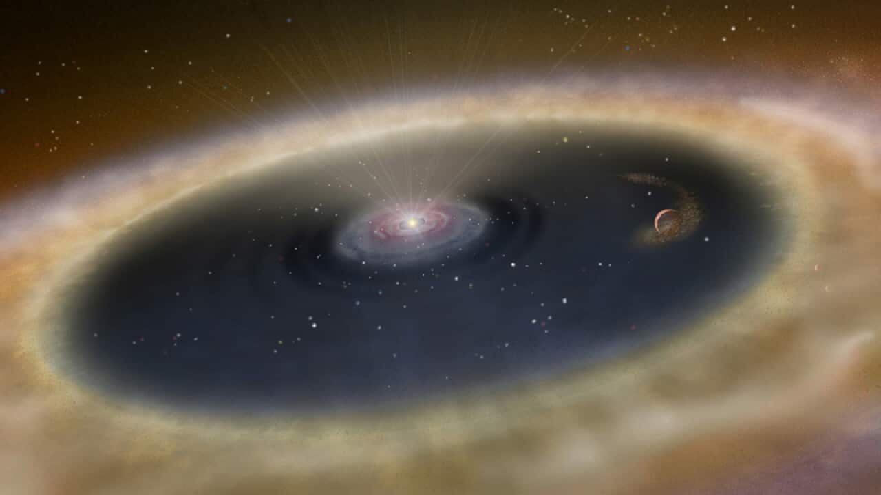 Artists rendering of a new planet, LkCa 15, forming around a star