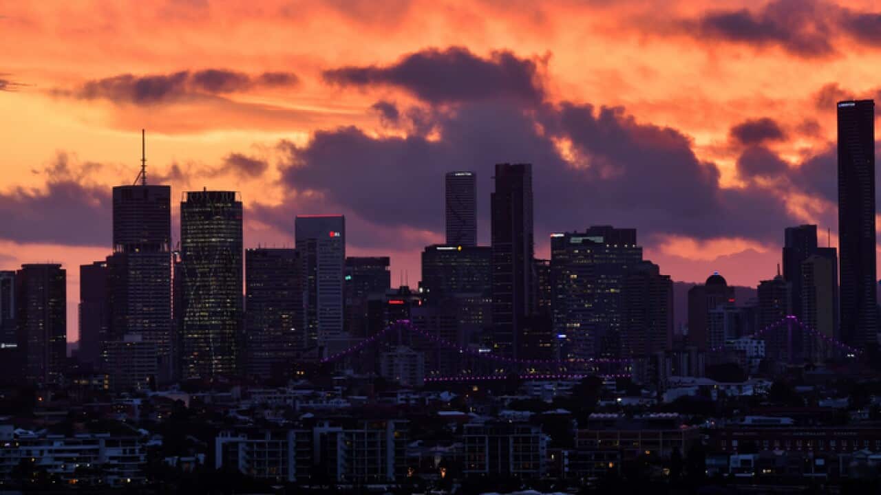 The Brisbane skyline is seen at sunset