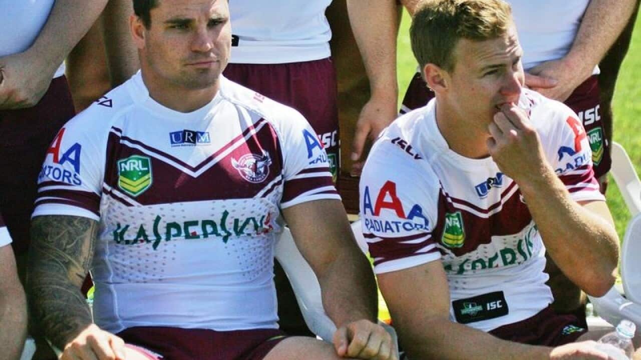 A file image of Manly's Anthony Watmough (L) and Daly Cherry Evans