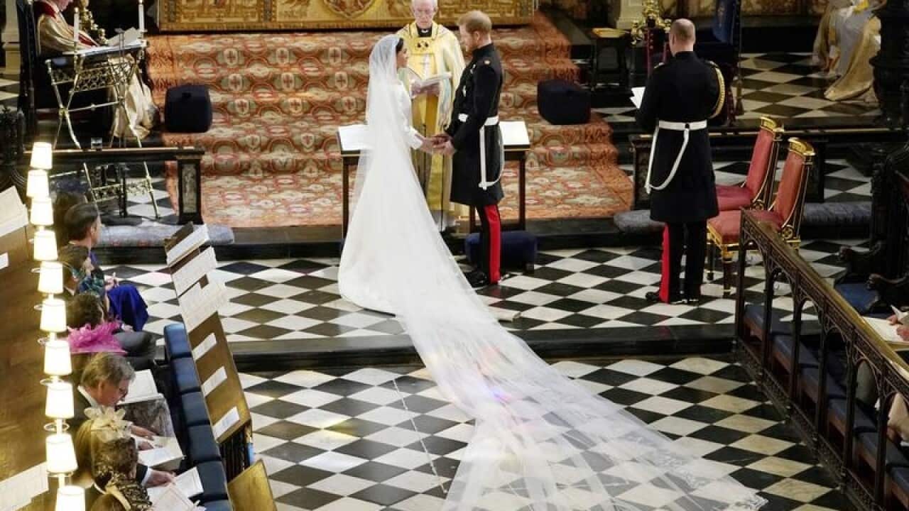 The Duke and Duchess of Sussex marry inside St George's Chapel.