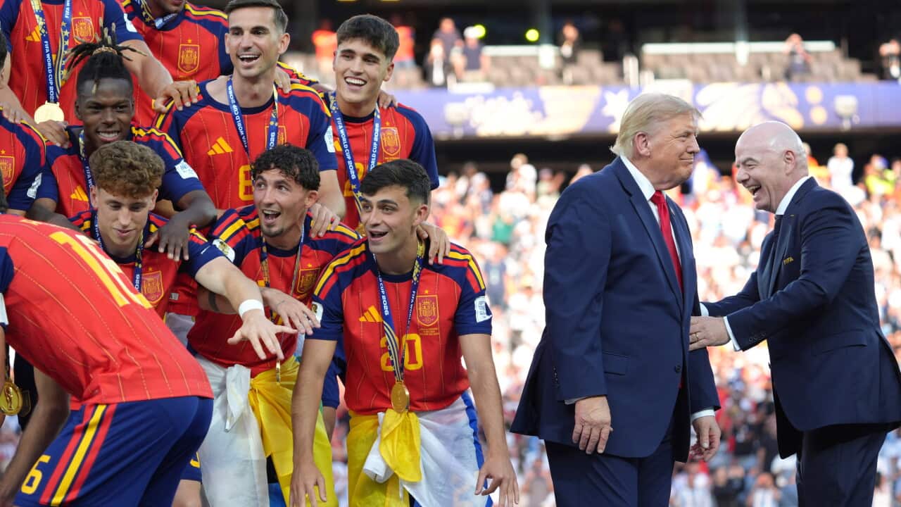 Spain players, from left, cheer alongside President Donald Trump and FIFA President Gianni Infantino at the conclusion of the World Cup championship final soccer match between Spain and Argentina in East Rutherford, N.J., Sunday, July 19, 2026.