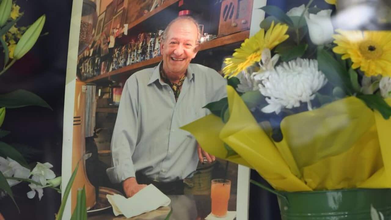A mural for Sisto Malaspina, co-owner of Pellegrini's Espresso Bar, is seen inside the restaurant on Bourke Street, Melbourne, Saturday, November 10, 2018. Sisto Malaspina was the victim of yesterday's terror attack. (AAP Image/James Ross) NO ARCHIVING