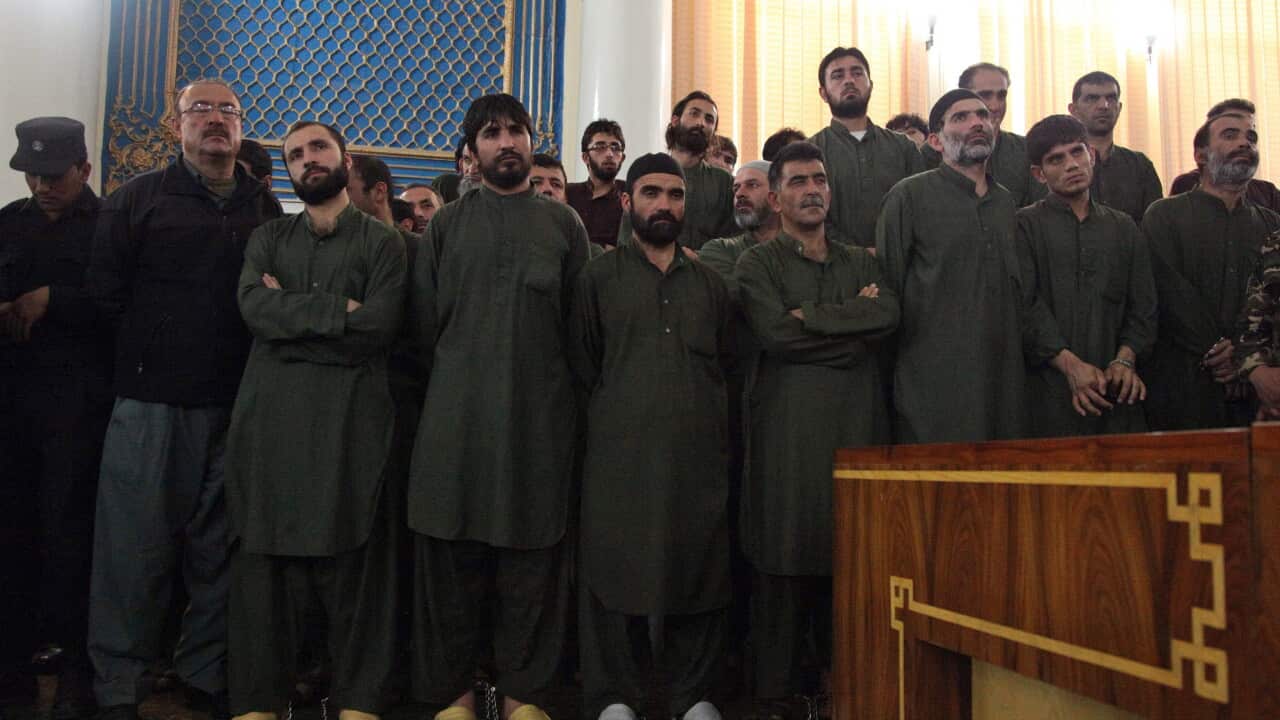 Dozens are being tried for mob killing of Afghan woman that sparked outcry