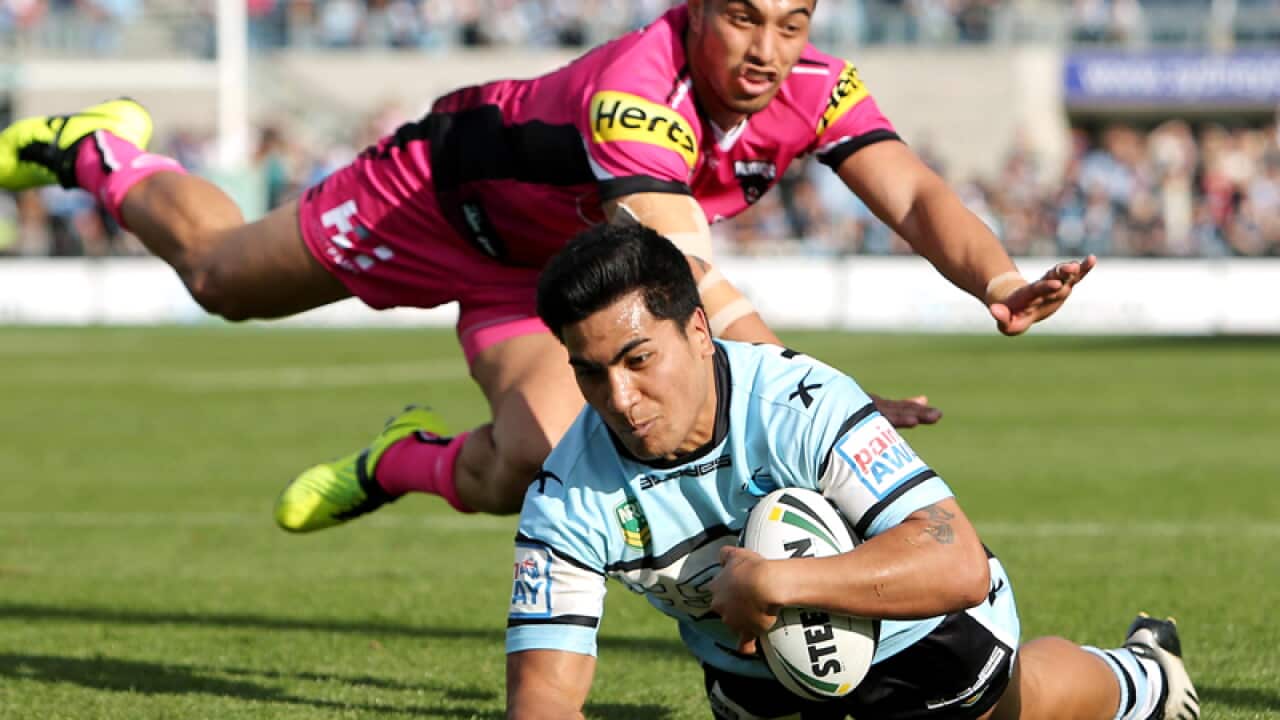 Sosaia Feki scores a try for the Sharks