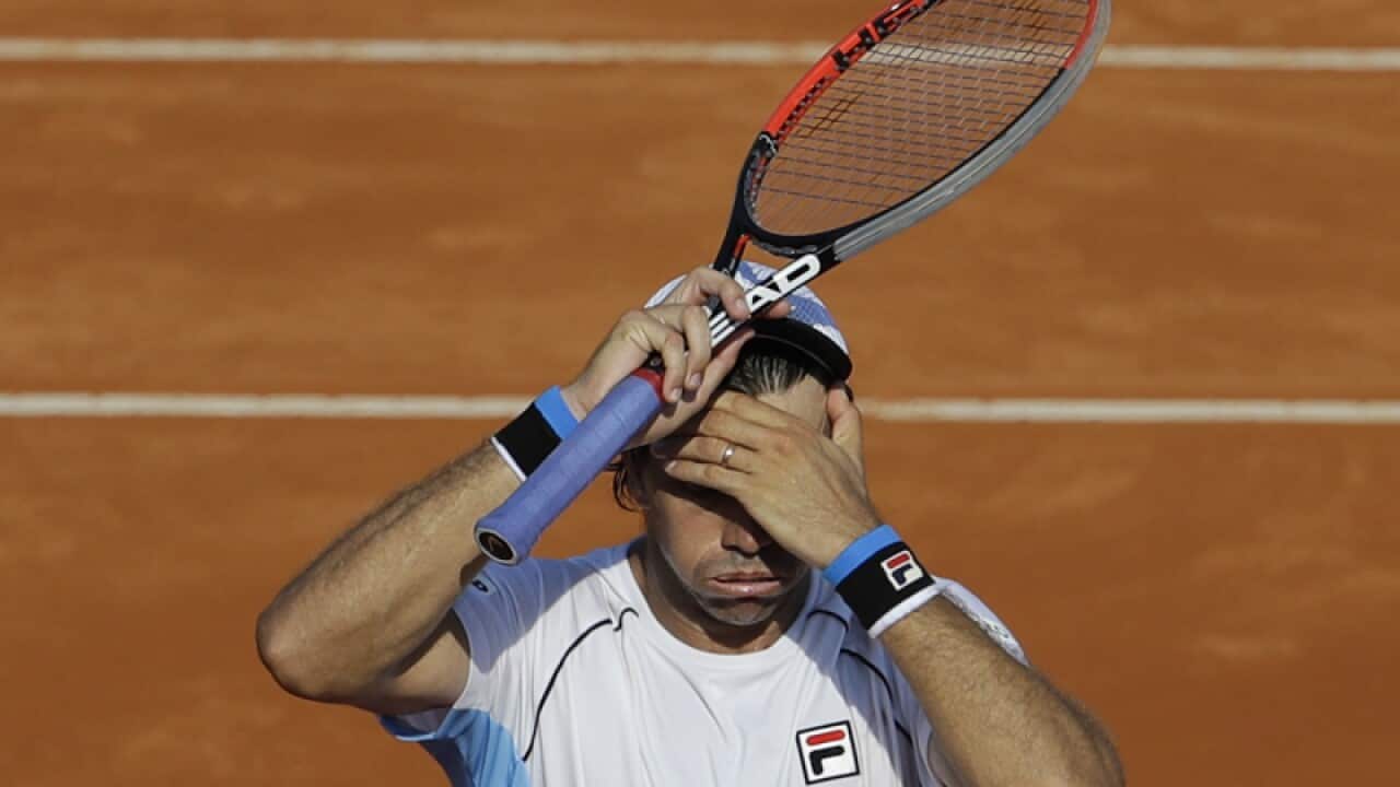 Argentina's Carlos Berlocq reacts