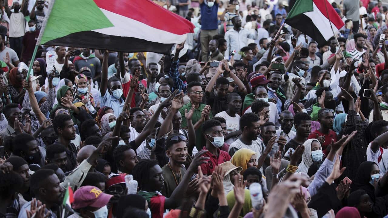 People chant slogans during a protest in Khartoum, Sudan