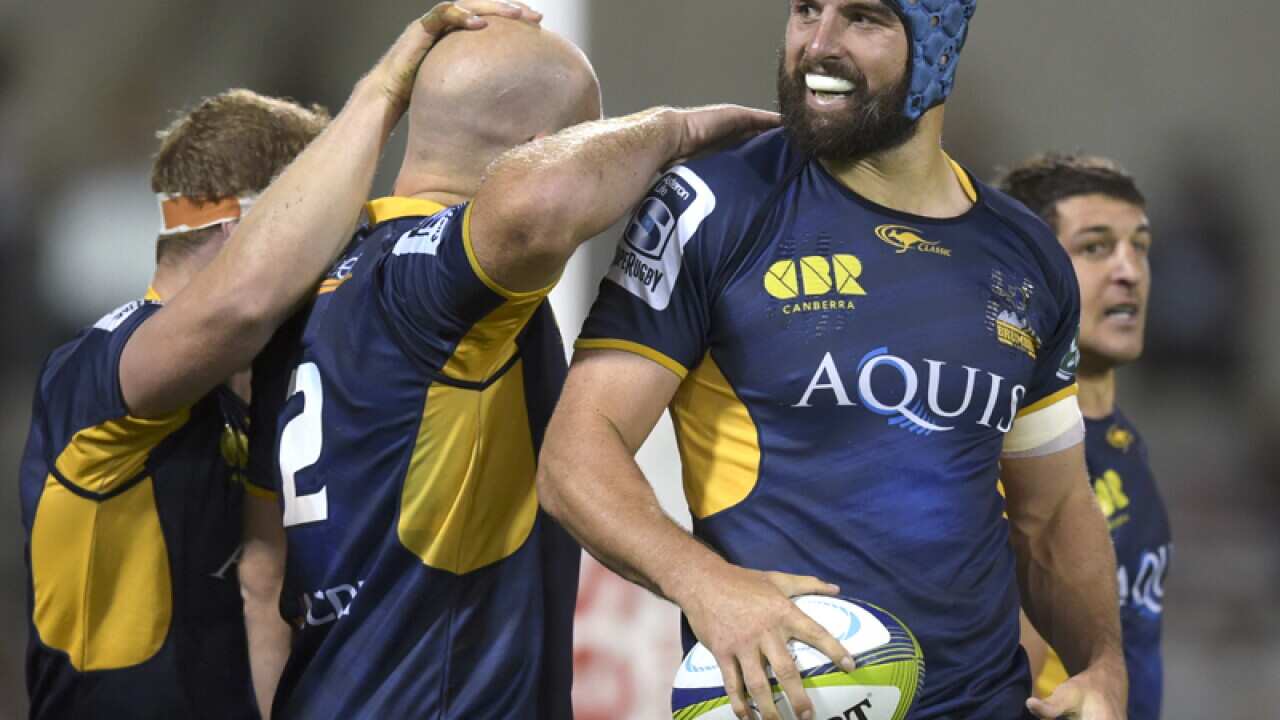 Scott Fardy of the Brumbies celebrates with team mates