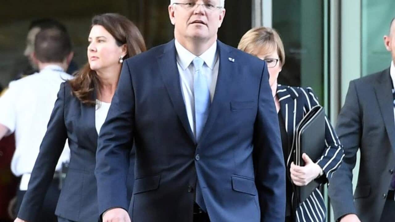Treasurer Scott Morrison arrives for the Liberal Party room meeting.