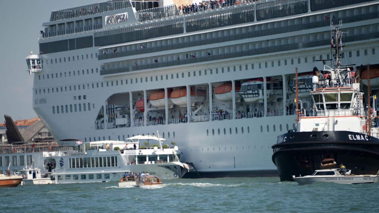 The cruise ship MSC Opera (R) is seen after the collision with a tourist boat, in Venice, Italy.