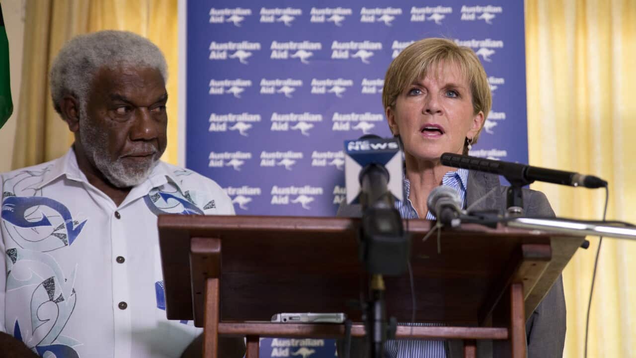 Australian Foreign Minister Julie Bishop discusses ongoing Cyclone Pam relief efforts with Vanuatu's Prime Minister Joe Natuman in Port Vila. (AAP)