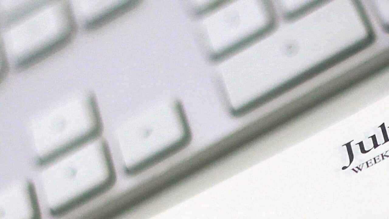 A 2015-2016 financial year diary is featured with reading glasses in a stock image in Sydney, Wednesday, Jan. 13, 2016. (AAP Image/Sam Mooy) NO ARCHIVING