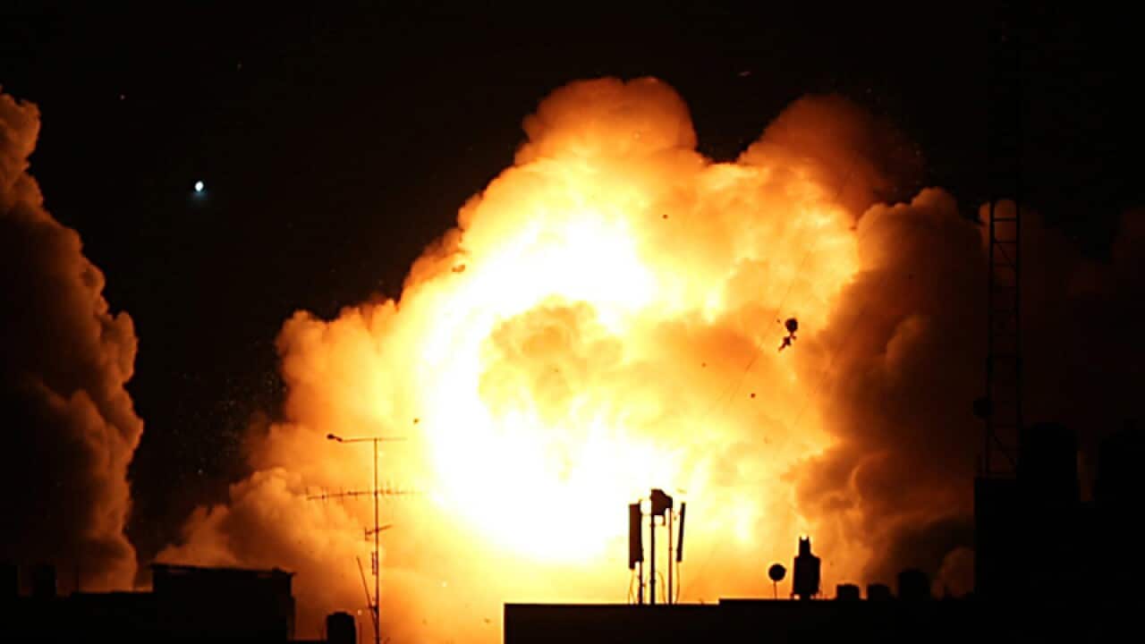 Smoke rises after Israeli air strikes in Gaza City