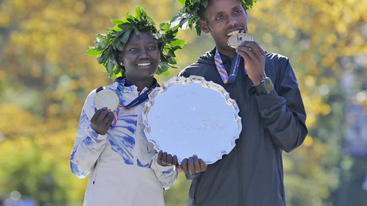 Mary Keitany and Lelisa Desisa