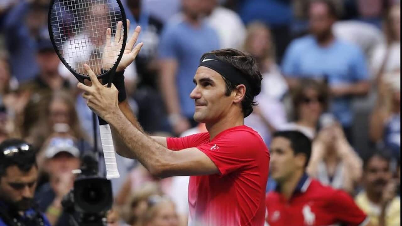 Roger Federer, of Switzerland, reacts after winning.