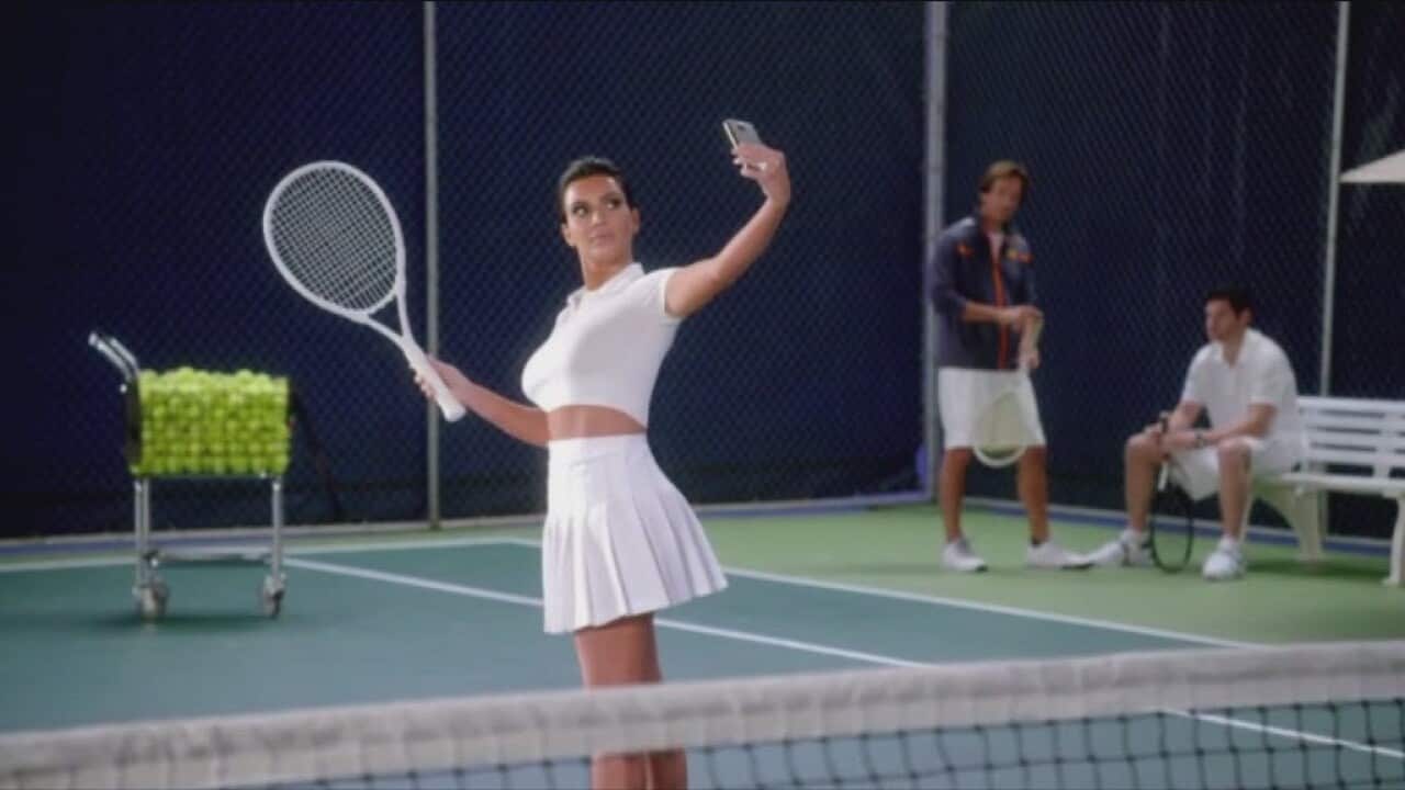 Reality star Kim Kardashian appears in a T-Mobile Super Bowl 2015 commercial.