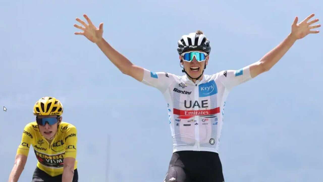 Tadej Pogacar (R) of UAE Team Emirates wins Stage 17 of the 2022 Tour de France ahead of (L) Jonas Vingegaard of Jumbo-Visma. Source: AFP / THOMAS SAMSON/AFP via Getty Images