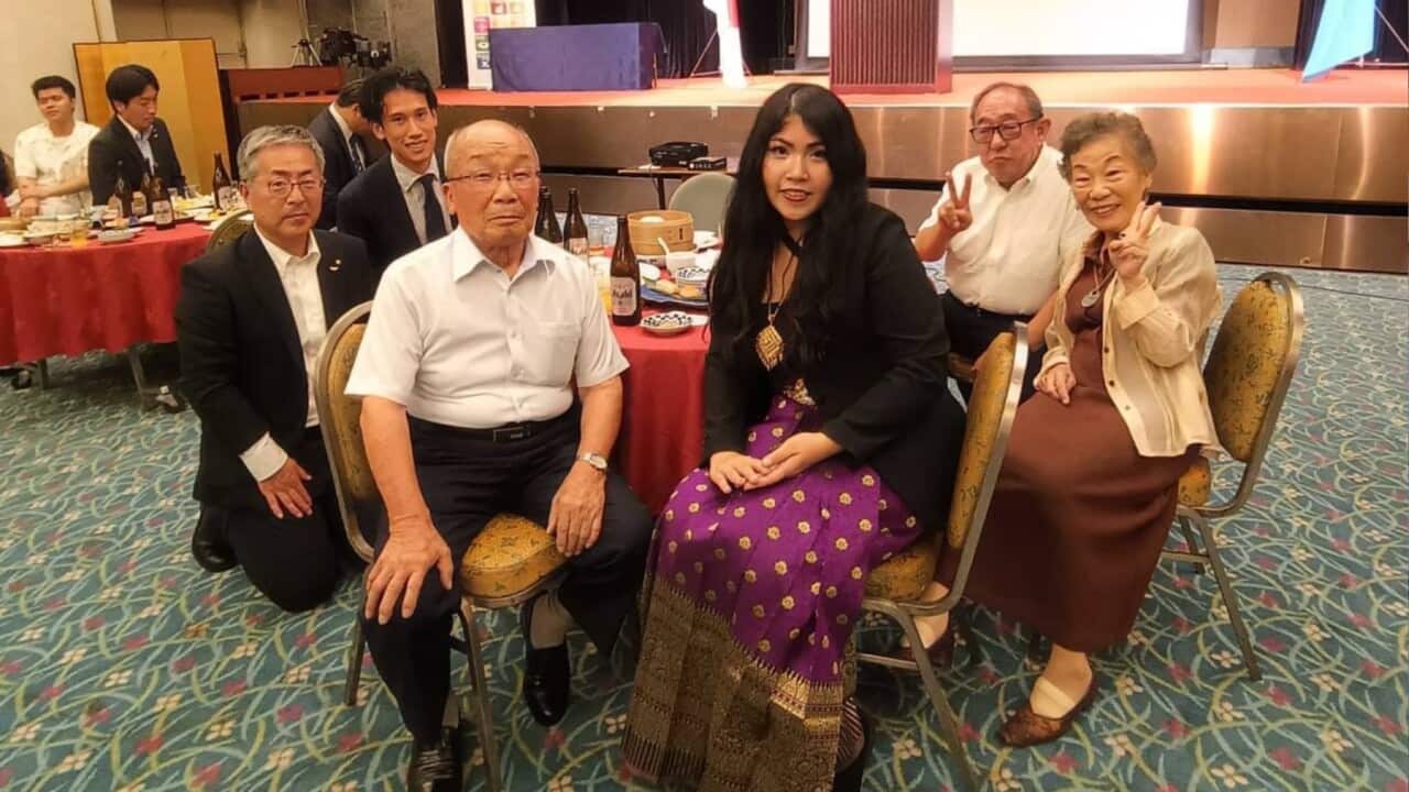 Simon Liu (L) is featured in a group photo with Nagasaki Atomic Bomb Museum director Takuji Inoue (2nd L) and hibakusha Seiichiro Mise (3rd left). (Supplied-Simon Liu).jpg