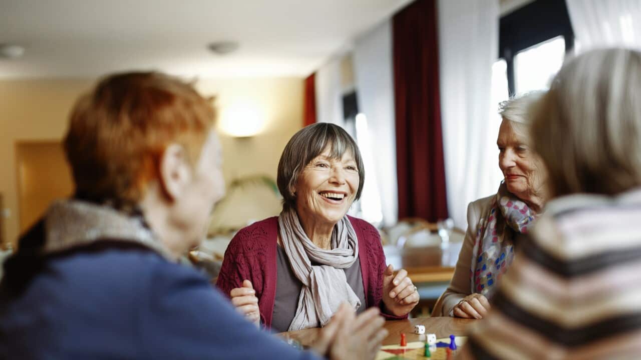Senior Women Playing Board Game