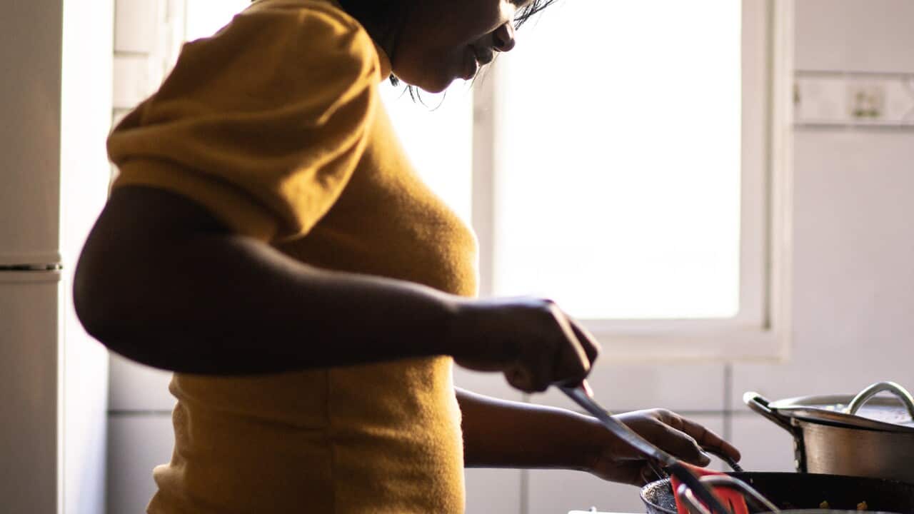 Woman cooking at home