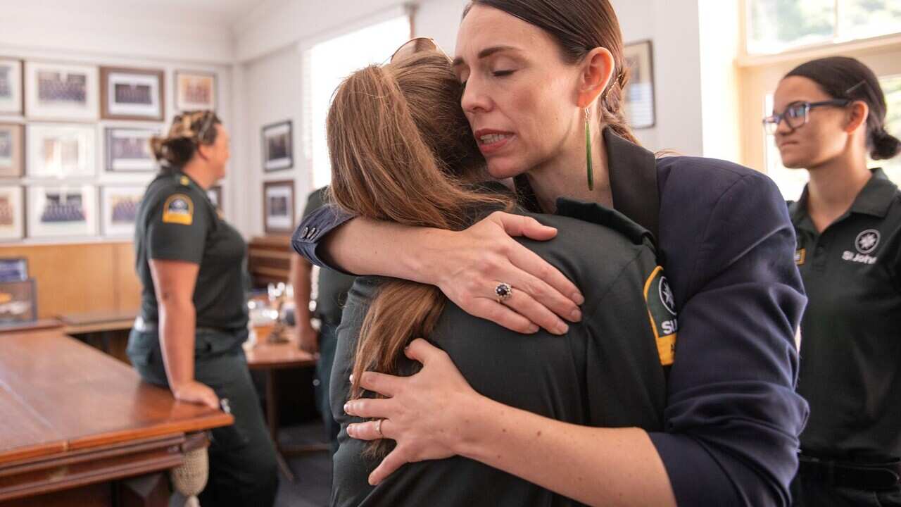 New Zealand Prime Minister Jacinda Ardern meets with first responders at the Whakatane Fire Station.