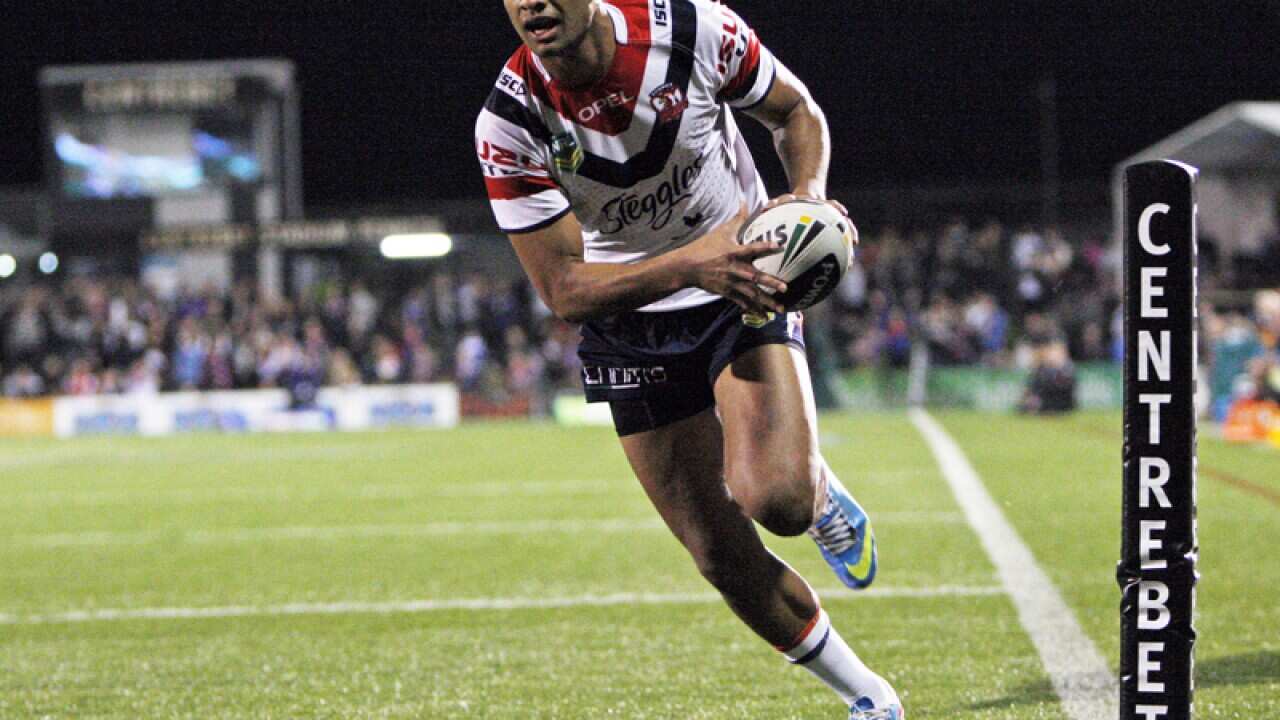 Daniel Tupou scores a try for the Roosters