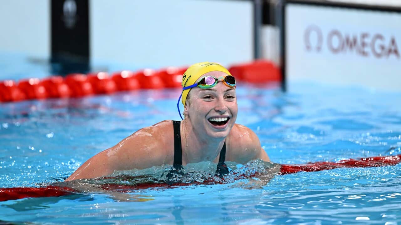 Australian swimmer Mollie O’Callaghan reacts after winning the Women's 200m Freestyle Final at Paris La Defense Arena