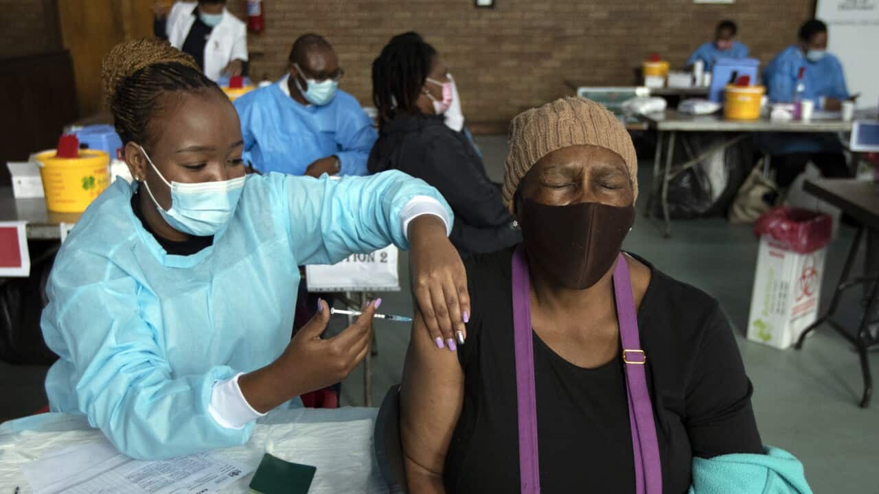 A woman receives vaccine jab in South Africa