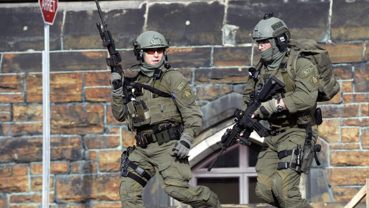 Armed police at the scene in Canada.