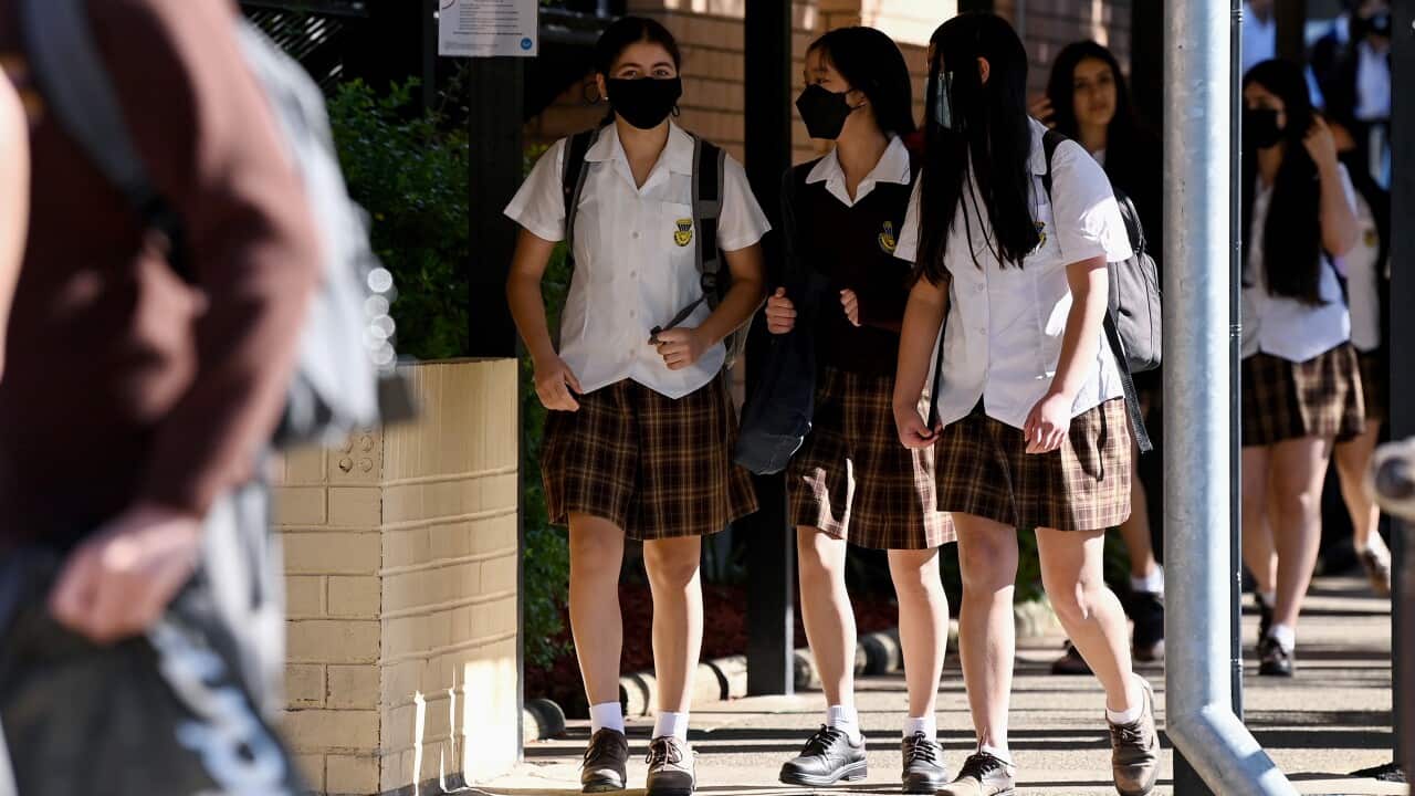 Students wear face masks to school (AAP)