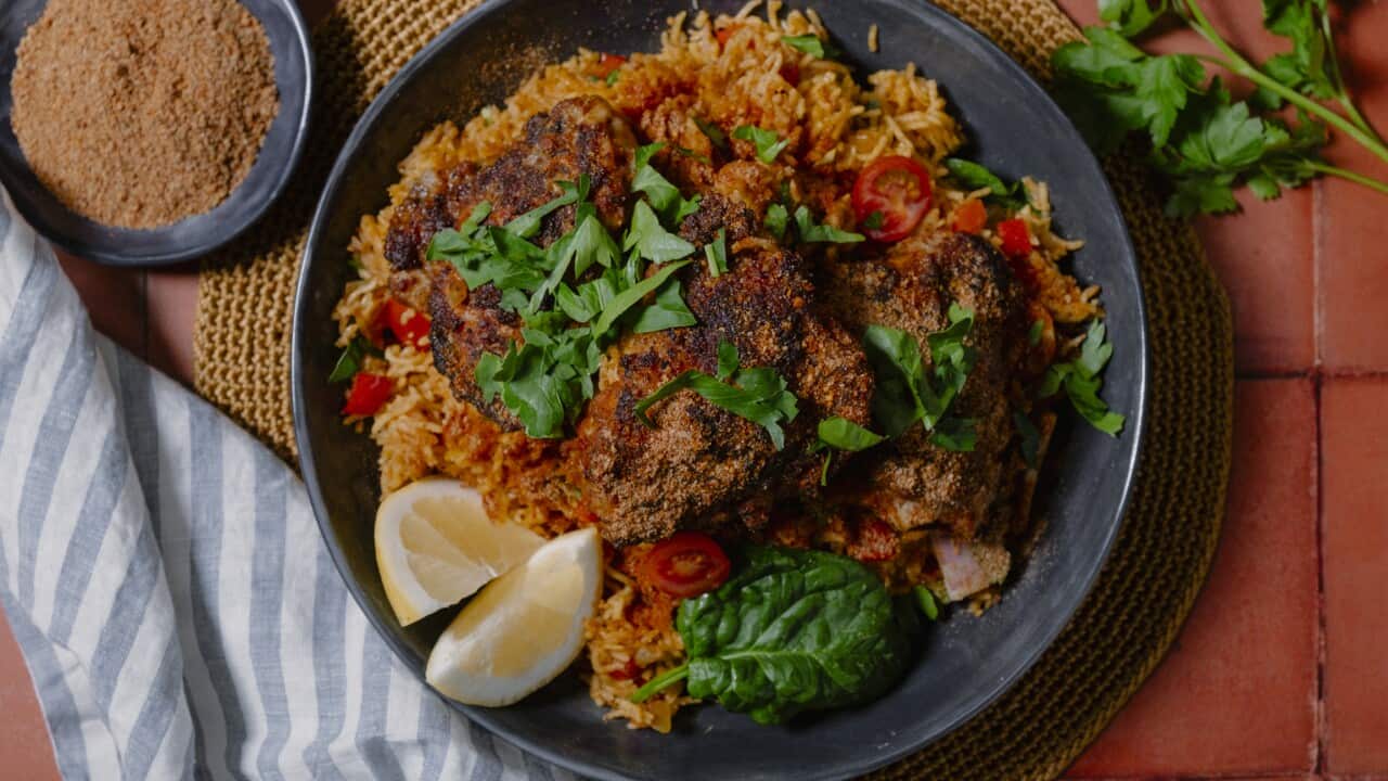 Suya chicken with tomato pilaf