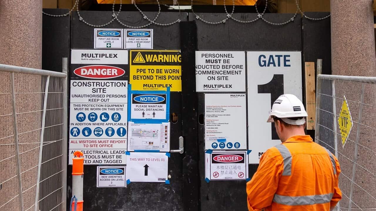 A construction worker at one of Melbourne's many construction sites