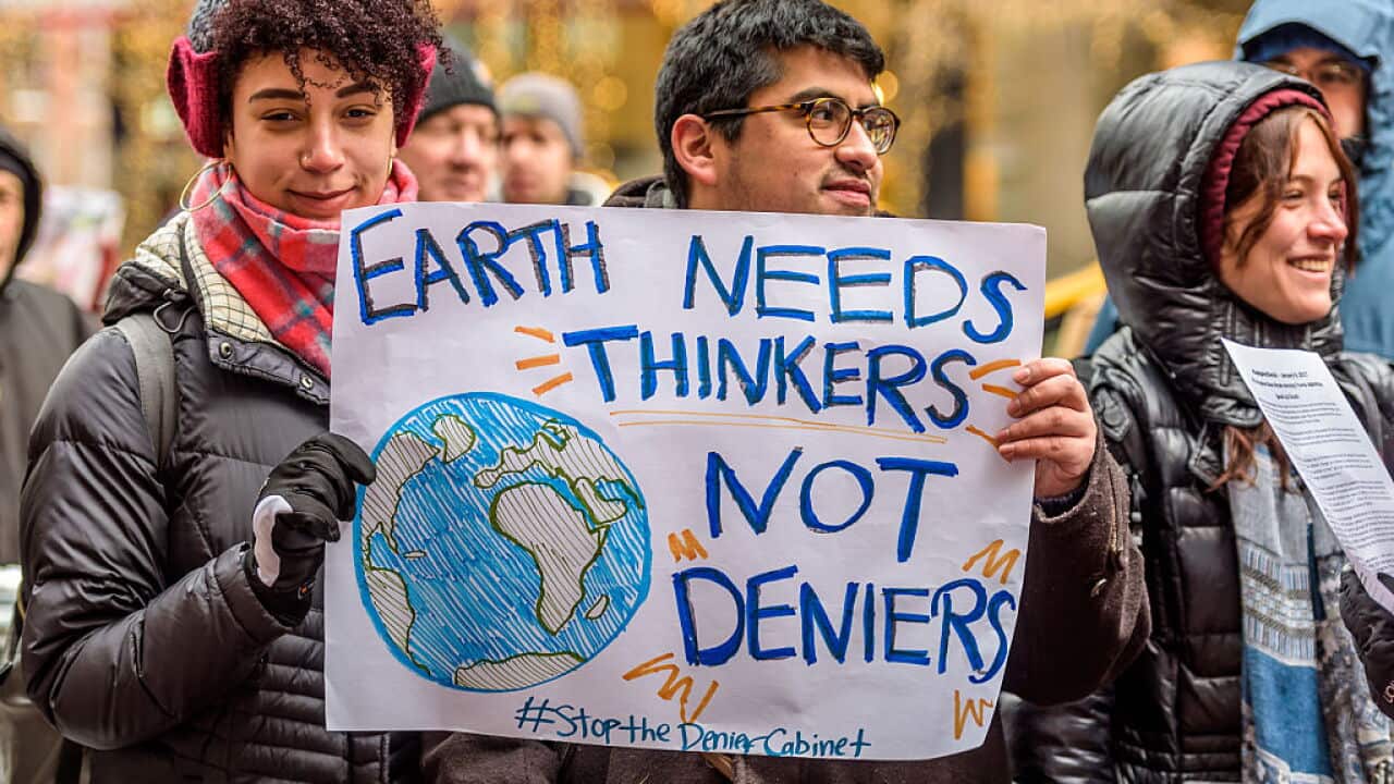 Activists march in protest of climate denial in New York in January.