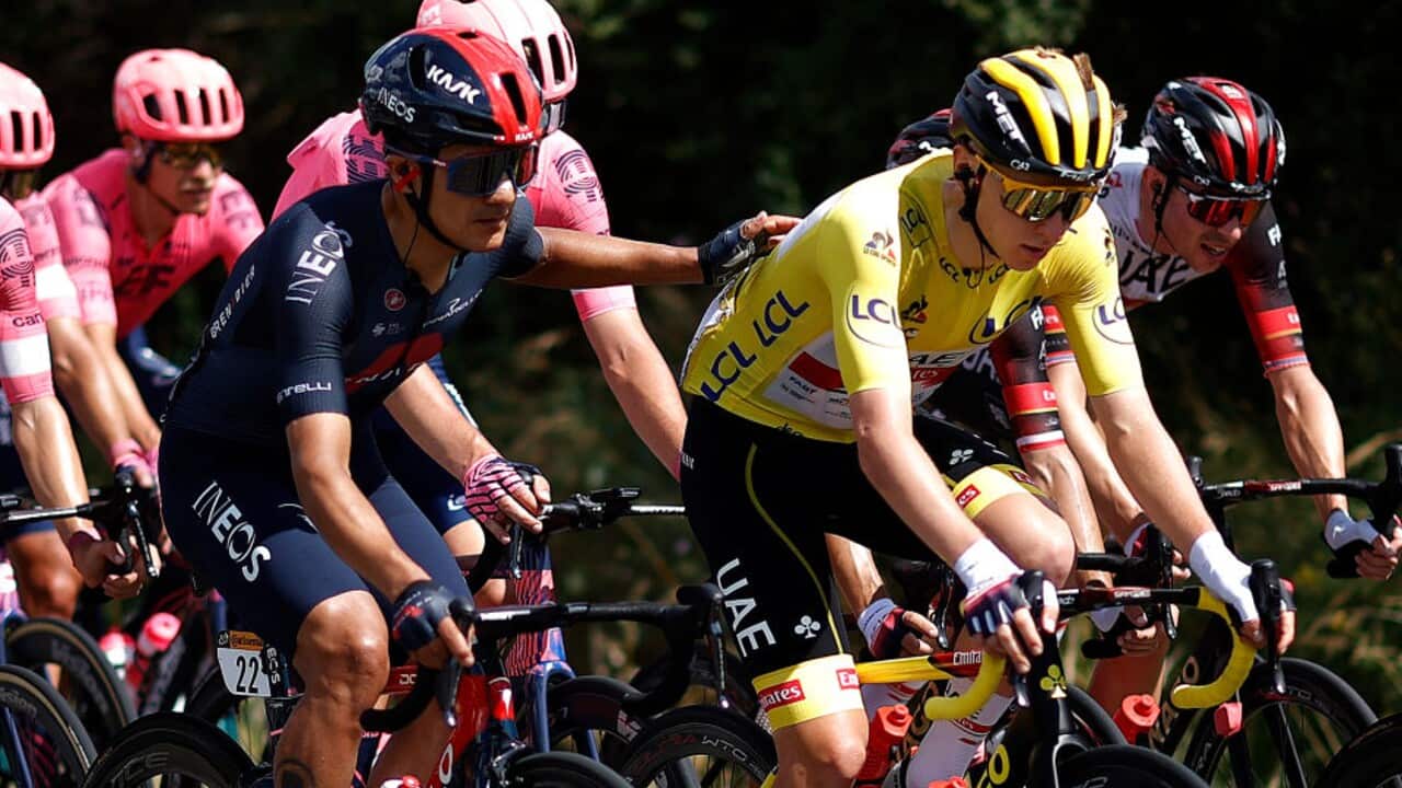 Richard Carapaz of Team Ineos-Grenadiers and UAE Team Emirates' Tadej Pogačar