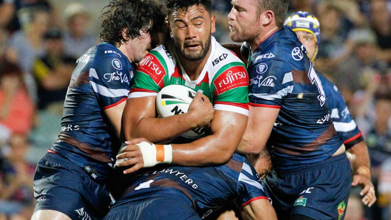 Rabbitohs Zane Musgrave tackled by Cowboys