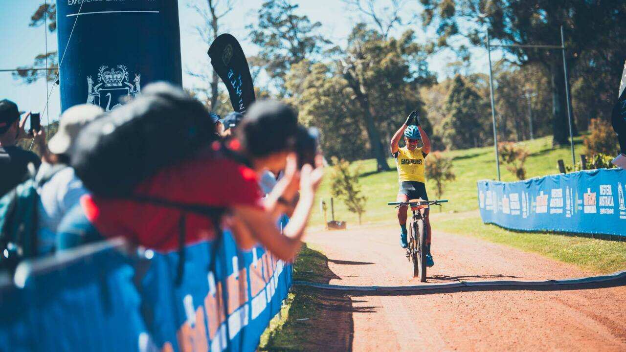 Brendan "Trekky" Johnston crosses the line at Leeuwin Estate, WA (Flow Mountain Bike/Cape to Cape)