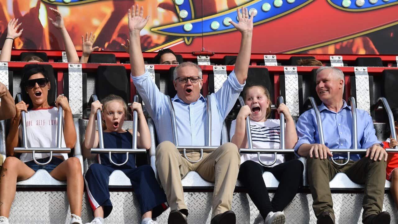 Prime Minister Scott Morrison with his daughters at last year's Royal Easter Show [AAP)