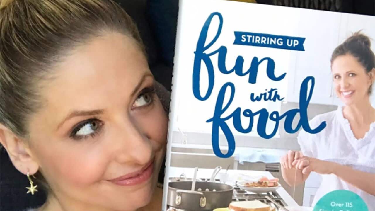 Sarah Michelle Gellar with her cookbook