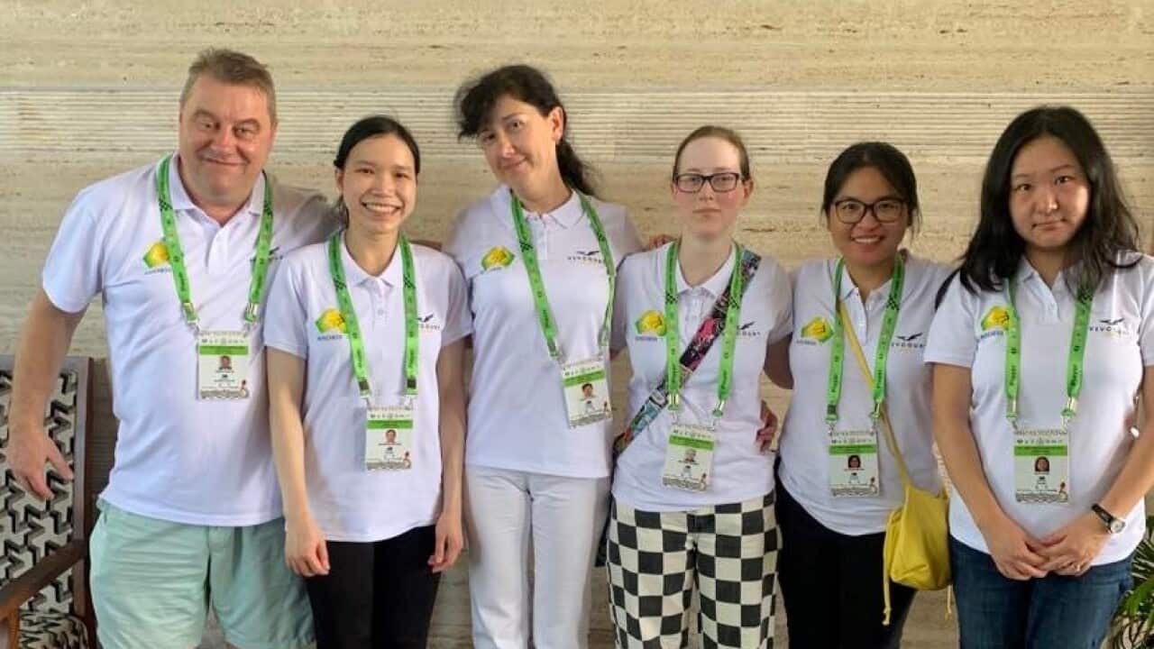 Australian women's team with captain Leonid Sandler before the opening of the 44th Olympiad in India