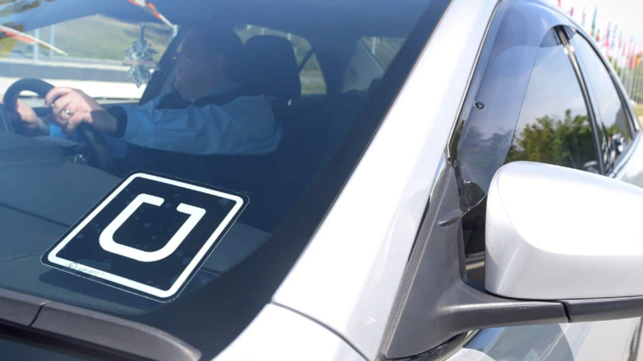 An Uber driver.