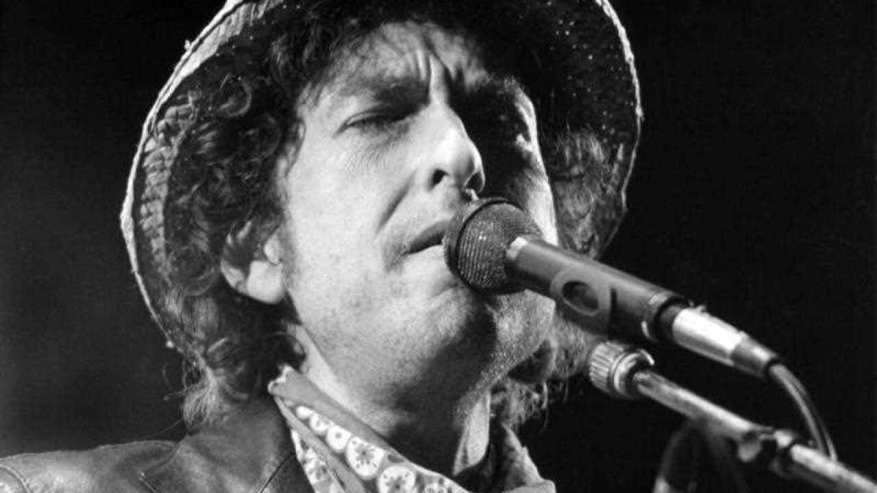 A file picture dated 03 June 1984 shows US musician Bob Dylan performing at an open air concert at the Olympic Stadium in Munich, Germany