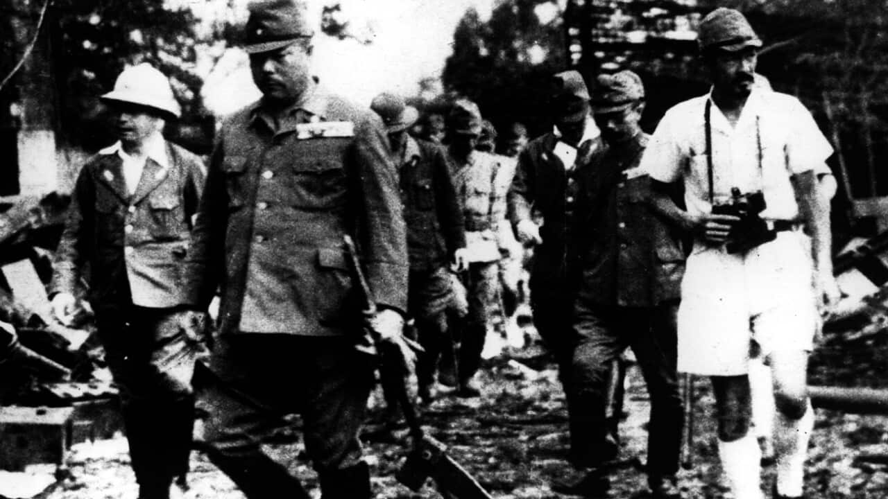 Japanese Commander General Hobun Yamashita examines damage in Singapore following the fall in 1942