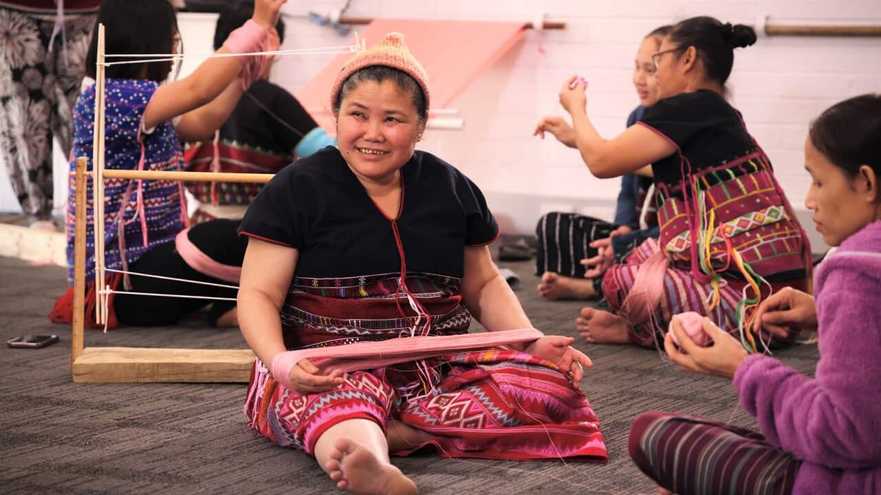 Karen women weaving at a community group in Perth (SBS Christopher Tan).jpg