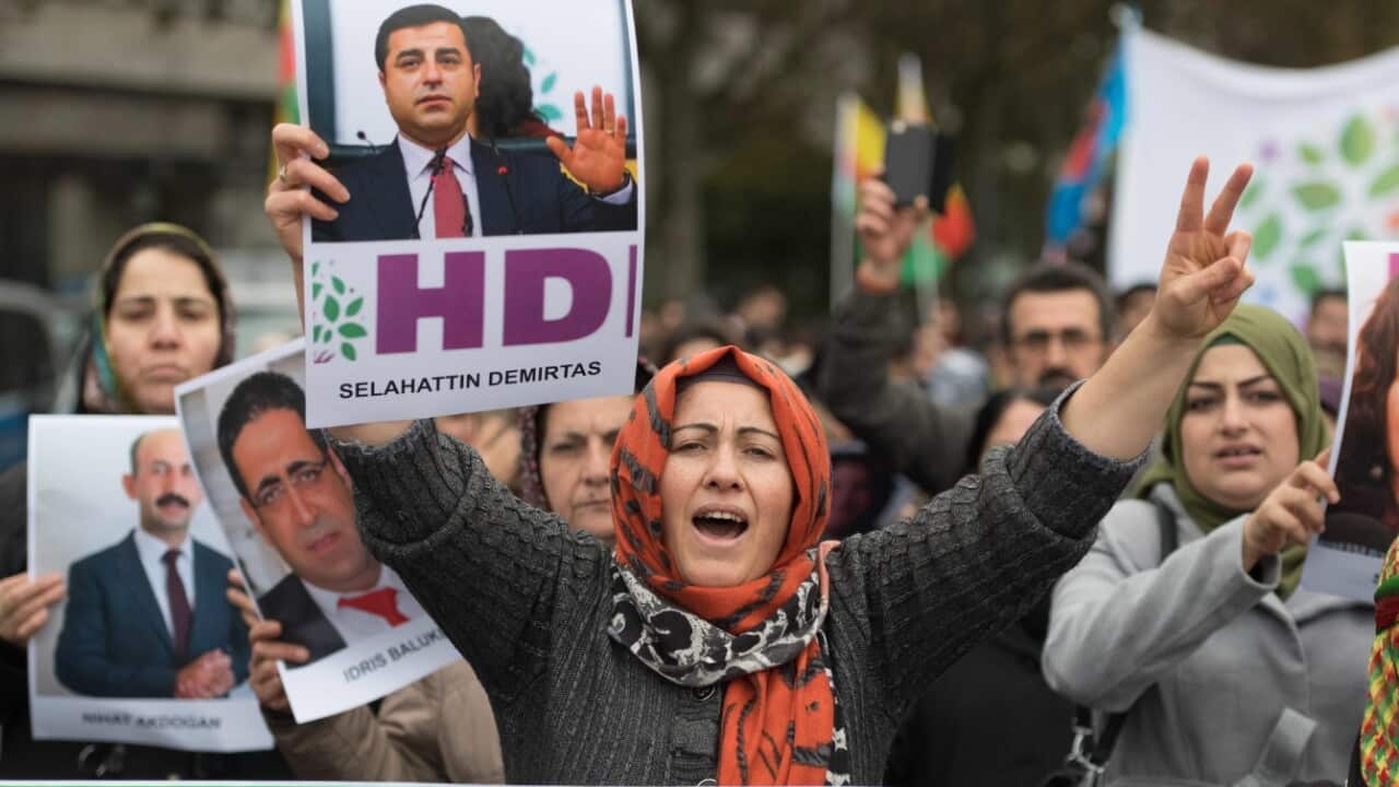 Kurdish demonstrator with banners protest against Turkish policies in Frankfurt am Main, Germany, 04 November 2016.